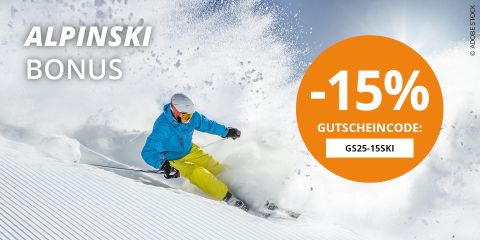 Ein Skifahrer in grauer Ausrüstung und mit Helm fährt einen verschneiten Hang hinunter. Der Text auf dem Bild bietet 15 % Rabatt mit dem Code GS25-15SKI. Der Hintergrund zeigt einen klaren blauen Himmel.